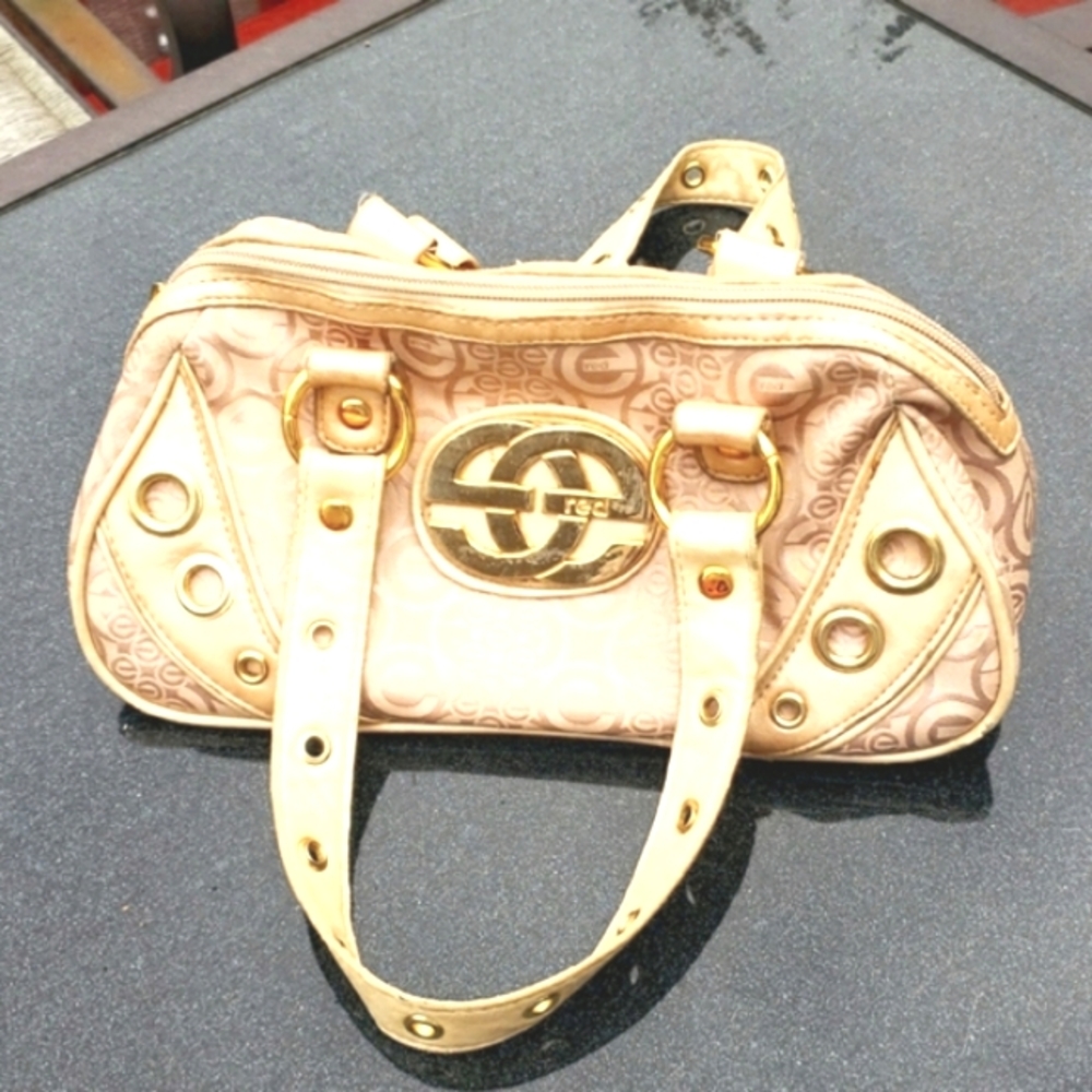 Beautiful metallic BAG by Marc Ecko